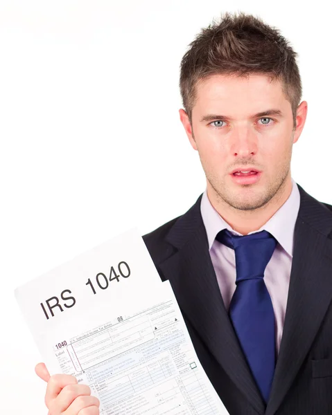 Man holding out his irs returns form — Stock Photo, Image