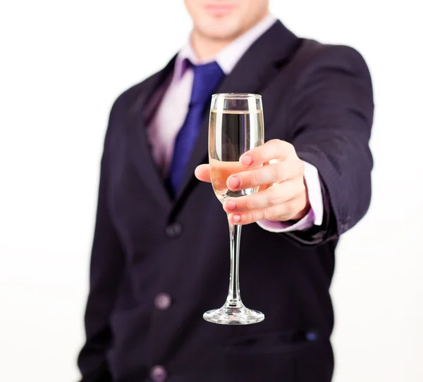 Zakenman die houdt van een glas champagne — Stockfoto