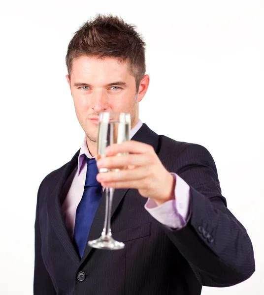 Zakenman die houdt van een glas champagne — Stockfoto