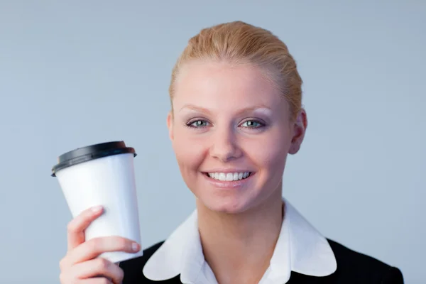 Businesswoman holding a coffee cup — Stock Photo, Image