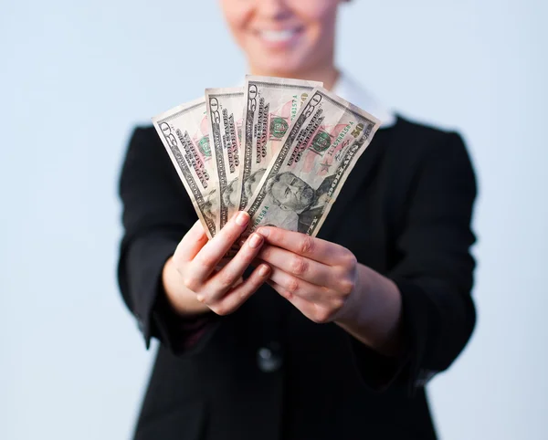 Obchodní žena drží dolary — Stock fotografie