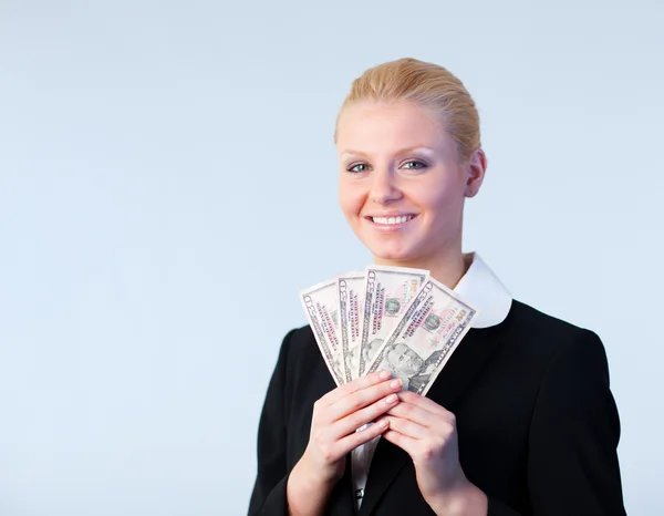Business woman holding dollar upp — Stockfoto