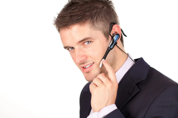 Podnikatel na sluchátka — Stock fotografie