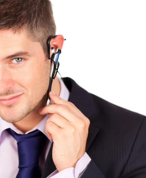 Man on headset looking at the camera — Stock Photo, Image