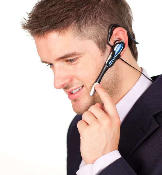 Homem de negócios falando em um fone de ouvido — Fotografia de Stock