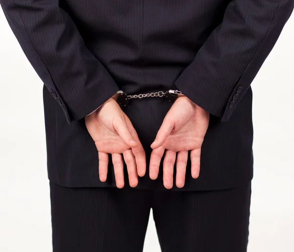 Businessman in hand cuffs — Stock Photo, Image