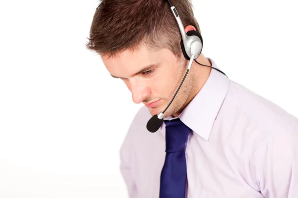 Man on a headset looking away from the camera — Stock Photo, Image