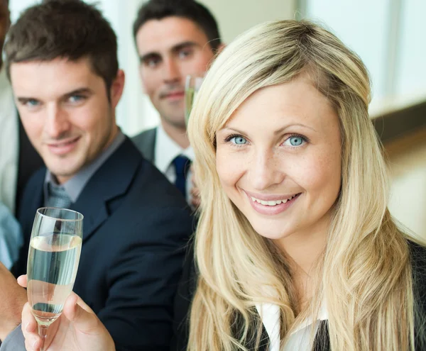 Businesspeople celebrating a success with champagne — Stock Photo, Image