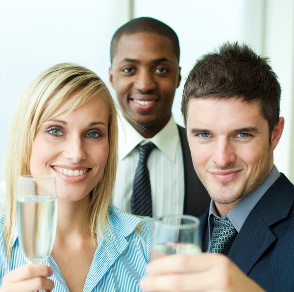 Portrait of businesspeople toasting with champagne — Stock Photo, Image