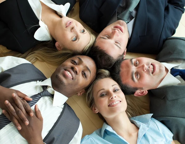 Closse-up of business lying in a circle on the floor — Stock Photo, Image