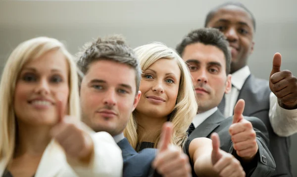 Business team with the thumbs up — Stock Photo, Image