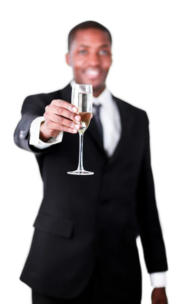 Bonito empresário segurando uma taça de champanhe — Fotografia de Stock