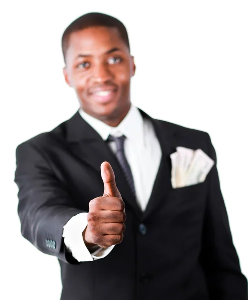 Close-up of a businessman with dollars in a pocket and thumb up — Stock Photo, Image