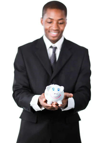 Portrét pohledný podnikatel drží prasátko — Stock fotografie