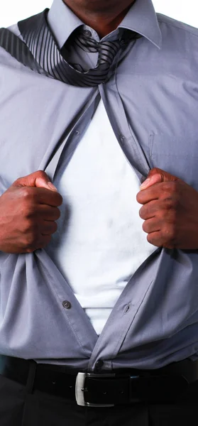 Close-up de um homem de negócios mostrando tshirt sob seu terno — Fotografia de Stock