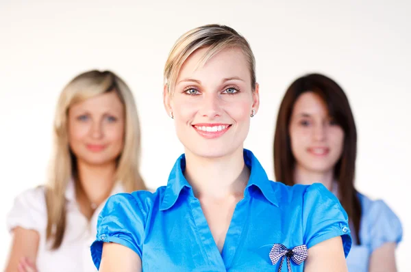 Businesswoman smiling at the camera with her tam — Stock Photo, Image