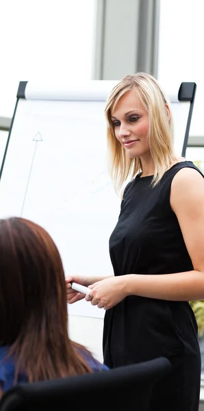 Beautiful businesswoman giving a presentation — Stock Photo, Image