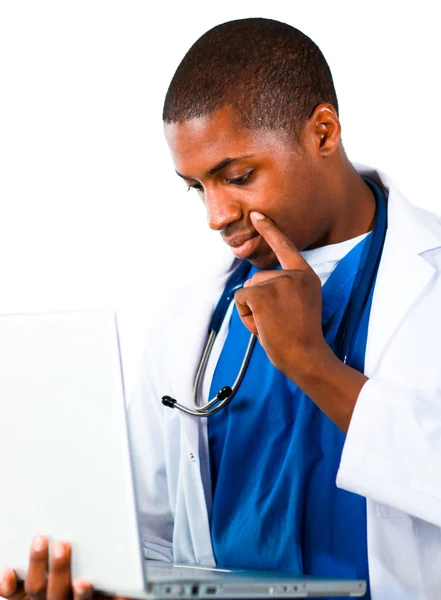 Thoughtful doctor working with a computer — Stock Photo, Image