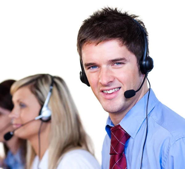 Handsome man in a call center — Stock Photo, Image