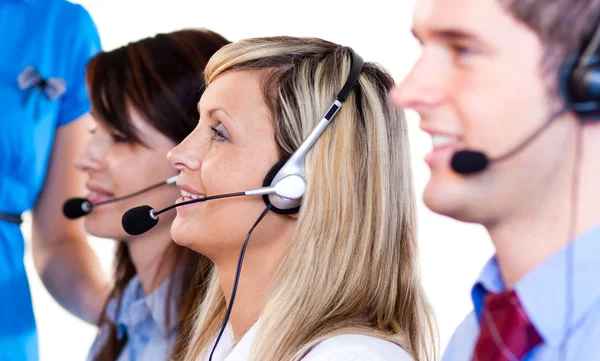 Team of talking with headsets on — Stock Photo, Image