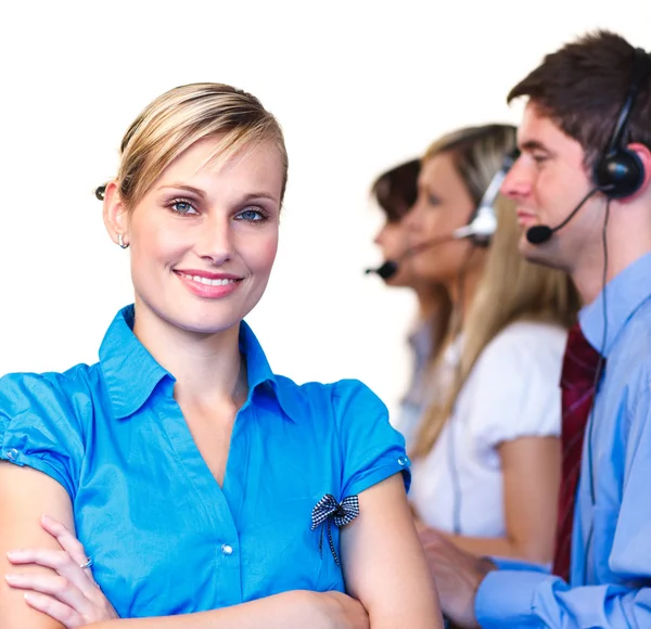 Young manager in front of her team — Stock Photo, Image