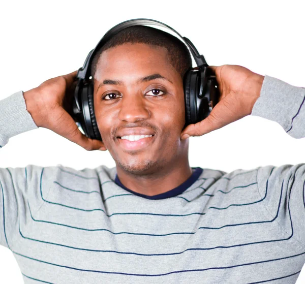 Ung vuxen lyssna på musik — Stockfoto
