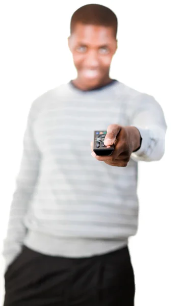 Young man with a remote control — Stock Photo, Image