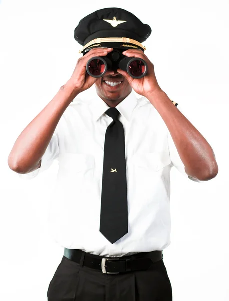 Piloot op zoek door middel van verrekijkers — Stockfoto