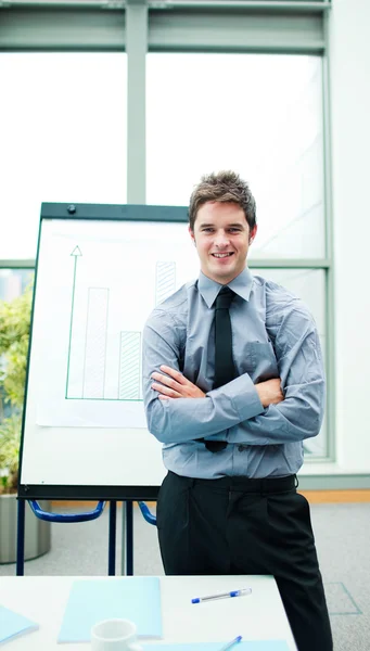 Smiling young businessman in office — Stock Photo, Image