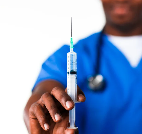 Doctor holding a syringe — Stock Photo, Image