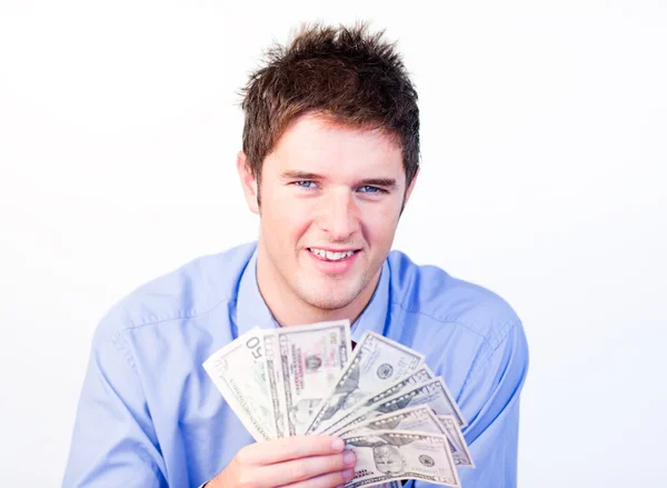 Jeune homme d'affaires montrant des dollars — Photo