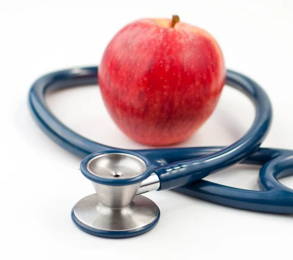 Stetoskop i jabłkiem — Zdjęcie stockowe