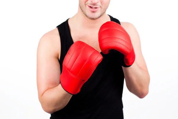 Giovane uomo che indossa guanti da boxe — Foto Stock