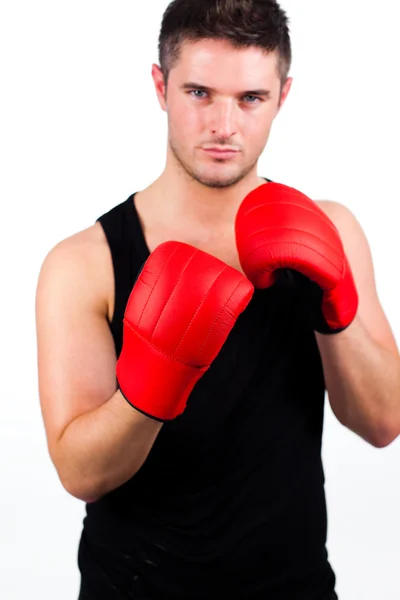 Jovem usando luvas de boxe — Fotografia de Stock