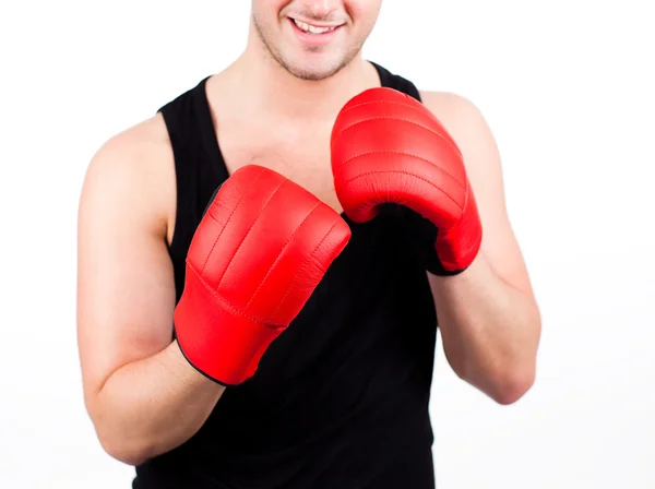 Junger Mann trägt Boxhandschuhe — Stockfoto