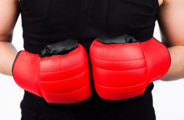 Young man wearing boxing gloves — Stock Photo, Image