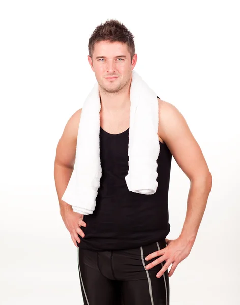 Unga athlethic man med en handduk runt honom — Stockfoto