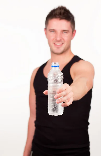 Happy Sportsman holding water bottle — Stock Photo, Image