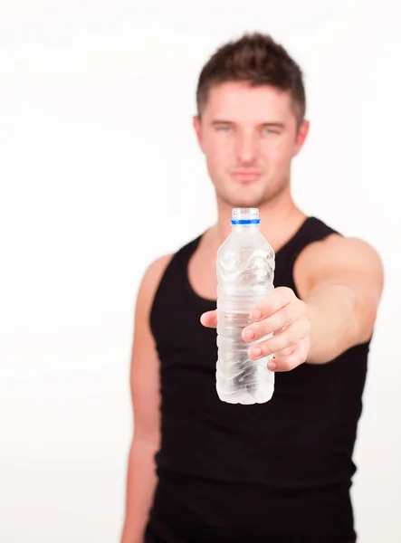 Happy Sportsman segurando garrafa de água — Fotografia de Stock
