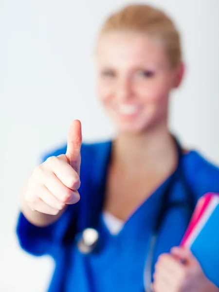 Doctor with thumb up to camera — Stock Photo, Image