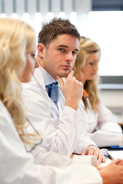 Team of doctors at a meeting — Stock Photo, Image