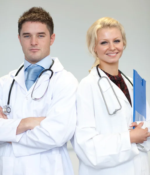 Two nice surgeons working together — Stock Photo, Image