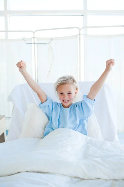 Happy child patient punching the air — Stock Photo, Image