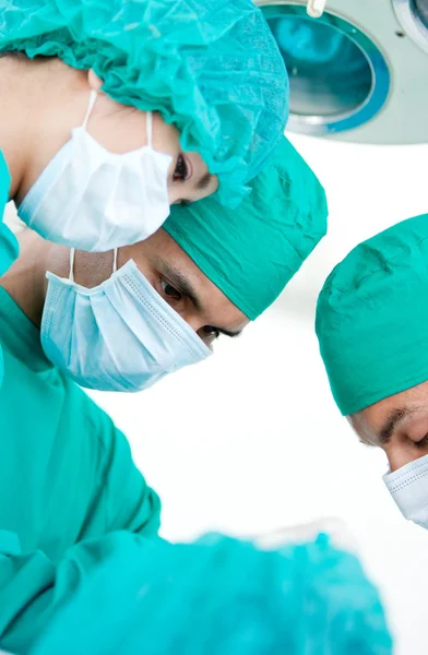 Medical partners looking at the patient — Stock Photo, Image