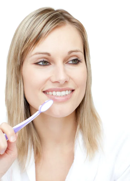 A fogkefe tartó sugárzó női — Stock Fotó