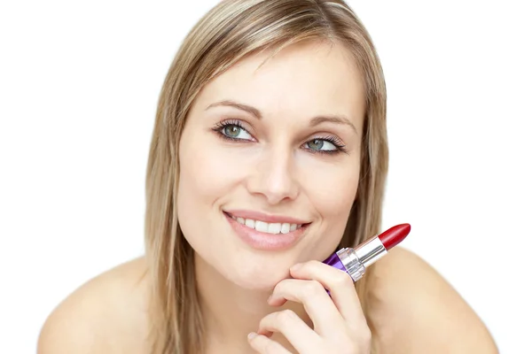 Attractive woman holding red lipstick — Stock Photo, Image