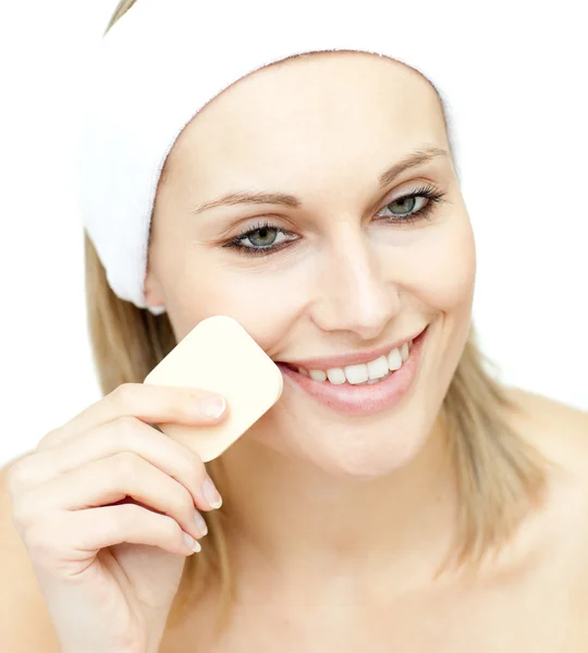 Happy woman putting foundation cream — Stock Photo, Image