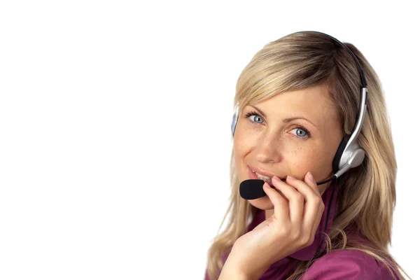 Jonge zakenvrouw praten over een headset — Stockfoto