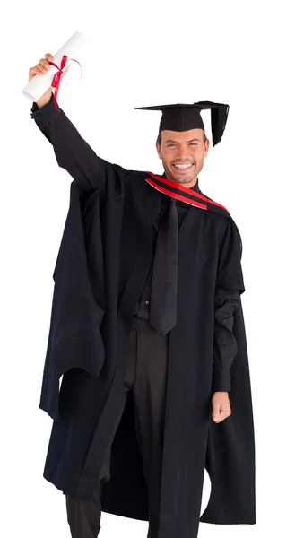 Щасливий випускник посміхається в камеру — стокове фото