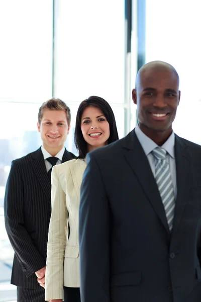 Businesswoman in focus with her team — Stock Photo, Image